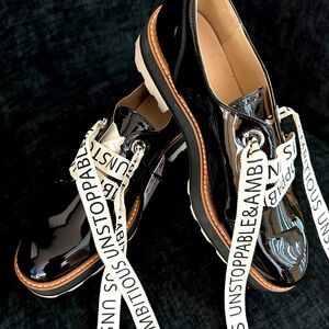 Black Patent Laced Oxfords.